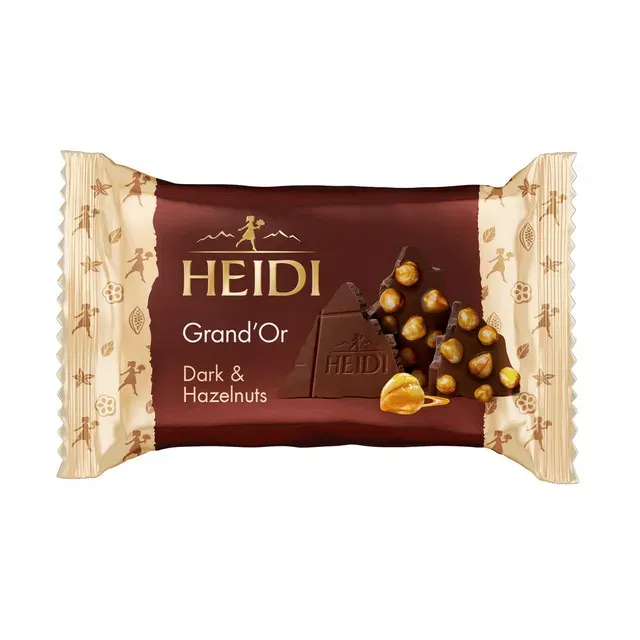 Ciocolata neagra cu alune de padure caramelizate Heidi Grand'Or, 27 g