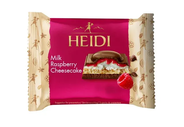 Ciocolata cu lapte si umplutura cu branza, biscuiti si zmeura Heidi, 55 g