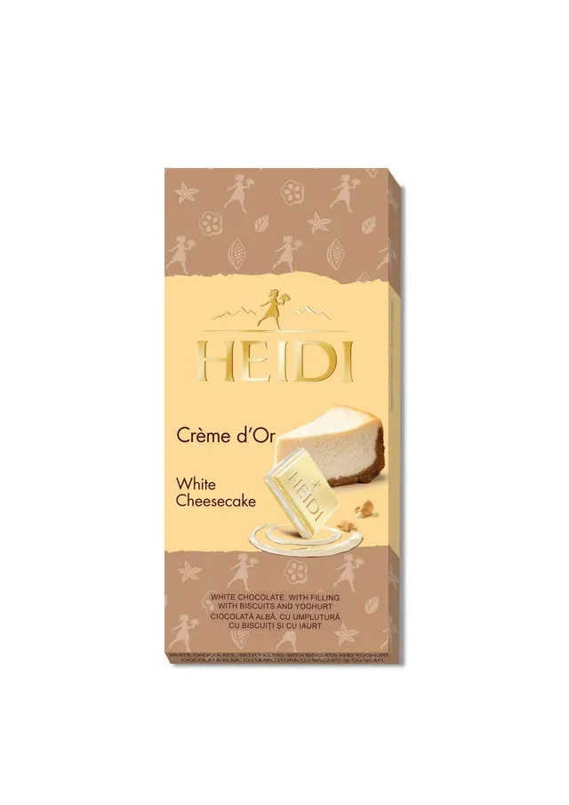 Ciocolata alba cu umplutura cu biscuiti si iaurt Heidi Crème d'Or, 90 g