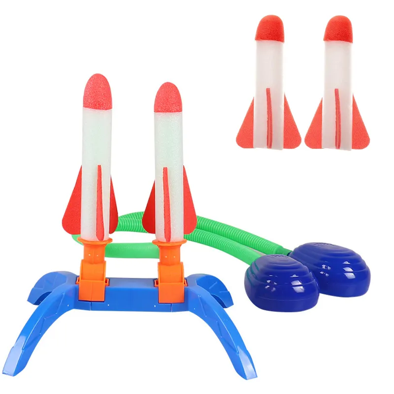 Set Lansator de Rachete, Hggzeg, 2 pedale, 4 Rachete, Din material moale special pentru copii, lansare prin salt, Cu LED, Aruncare pe baza de presiune a aerului, Directie reglabila, Joc de exterior, 3 ani +, Multicolor, 25x29 cm