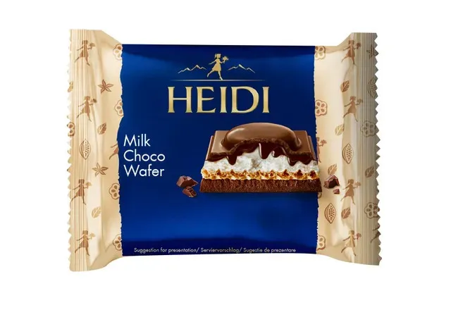 Ciocolata cu lapte si umplutura cu lapte, alune de padure si foi de napolitana Heidi, 55 g