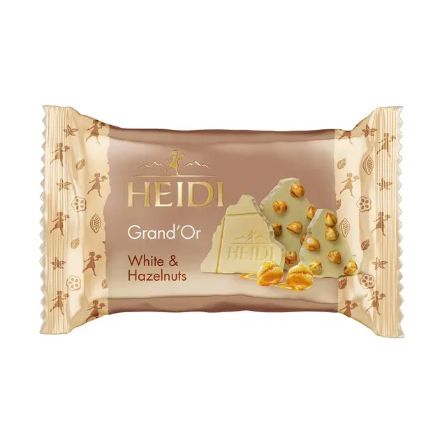 Ciocolata alba cu alune de padure caramelizate si fulgi de porumb Heidi Grand'Or, 27 g